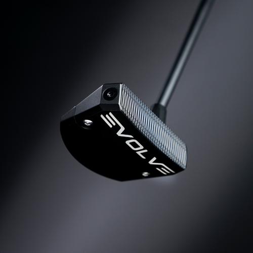 A close-up studio shot of a black golf putter head with the brand name 'EVOLVE' printed in white on the face, suspended against a dark gradient background.